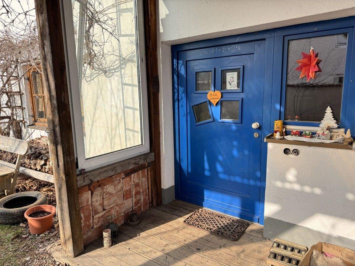 Immobilie in Markt Wald - Charmante Doppelhaushälfte mit zwei Wohneinheiten, ausbaufähigem Dachgeschoss und Naturgarten - Bild 1
