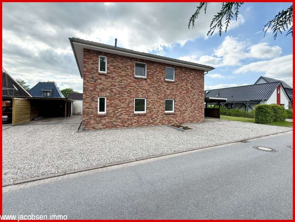 Immobilie in Jübek - Stilvoll und modern Wohnen - sehr gepflegtes Zweifamilienhaus in bester Wohnlage - Bild 1