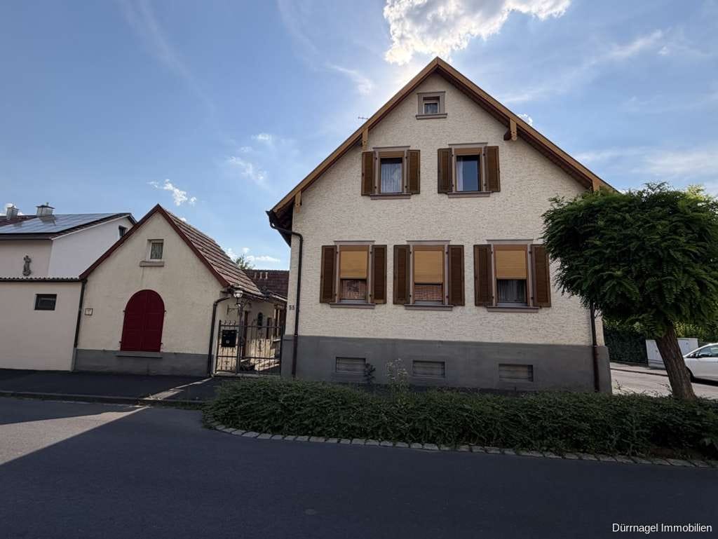 Immobilie in Veitshöchheim - Wohnen mit Potenzial – Einfamilienhaus mit vielseitigen Nebenflächen - Bild 0