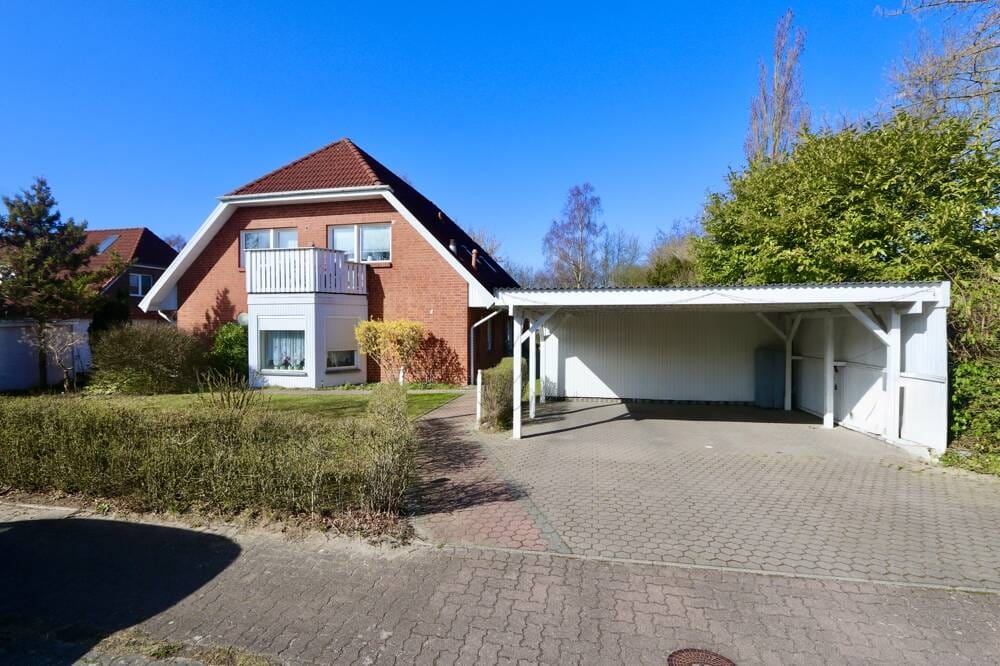 Immobilie in Elmenhorst/Lichtenhagen - Wohnen mit Wohlfühlklima - 207 m² Niedrigenergiehaus mit ELW & Doppelcarport in Lichtenhagen-Dorf. - Bild 1