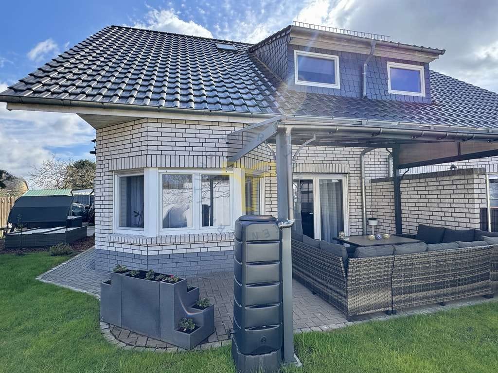 Immobilie in Rötgesbüttel - Sorgenfrei investieren: Vermietete Doppelhaushälfte in Rötgesbüttel - Bild 1