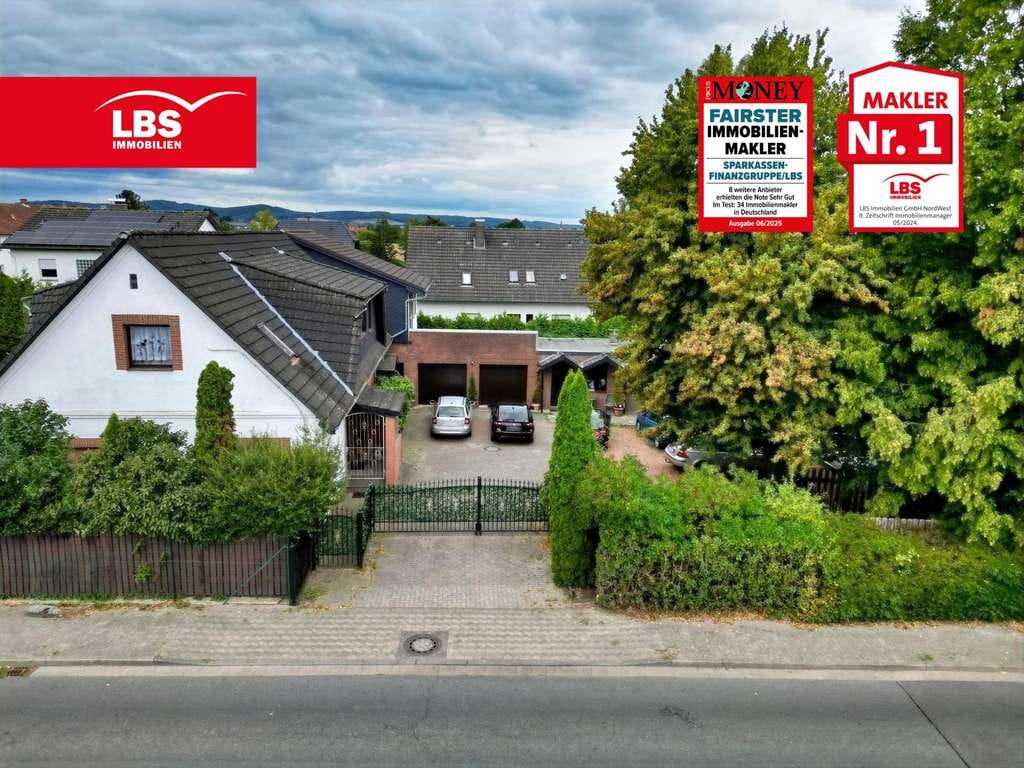 Immobilie in Lübbecke - Für Familien & Investoren: In Toplage - Großzügiges Zweifamilienhaus mit Büro, Garagen & Bauplatz..  - Bild 0