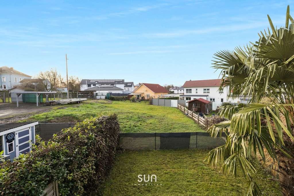 Immobilie in Sprendlingen - Ruhig gelegenes Familienhaus in Sprendlingen (RLP) mit Garten und Dachterrassen - Bild 1