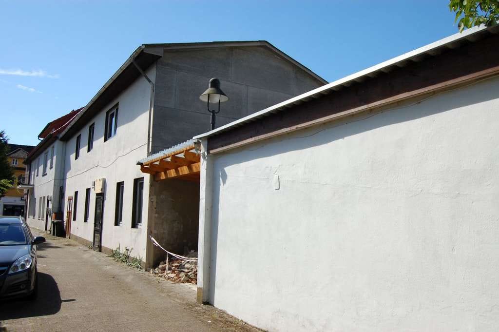 Immobilie in Wildeshausen - Mehrfamilienhaus mit Gewerbeeinheit und Baugrundstück in Wildeshausen - Bild 3