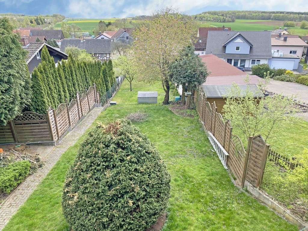 Immobilie in Mücke - Großzügiges Zweifamilienhaus mit Garten – ideal für Familien - Bild 4