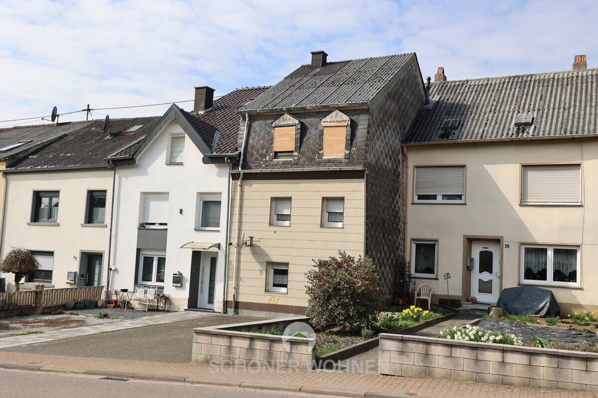 Immobilie in Mettlach - Orscholz: "Klein, aber mein" | Reihenhaus in zentraler Lage mit 3 Schlafzimmern - Bild 0