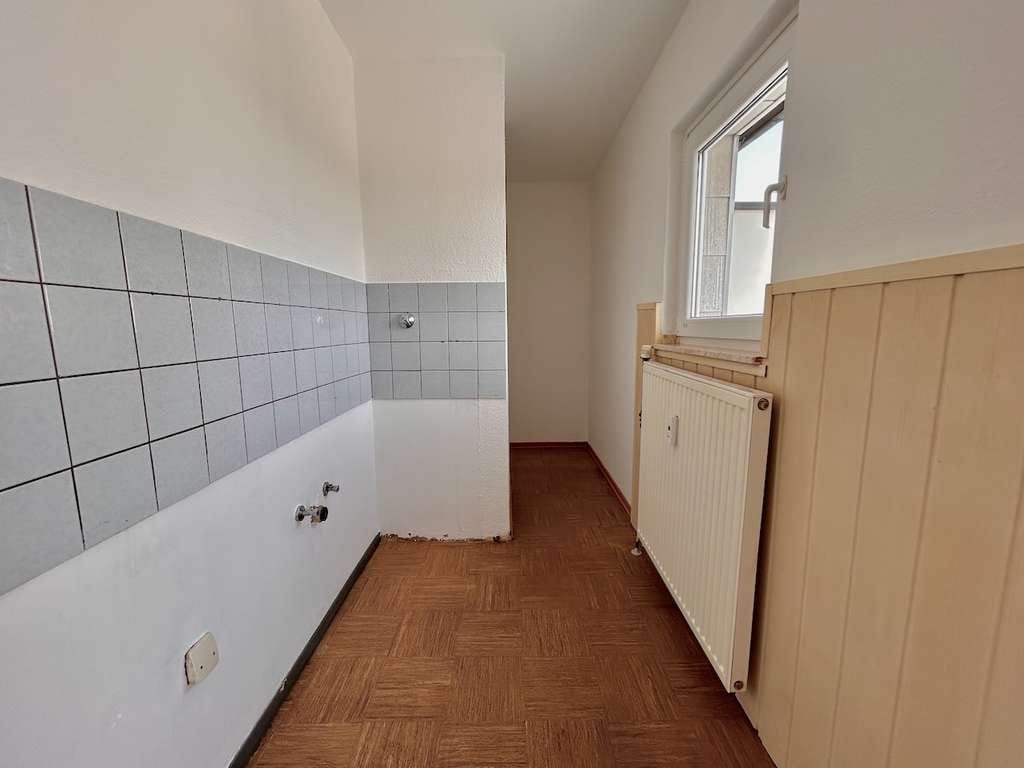 Immobilie in Neuss - Kompakte Dachgeschosswohnung mit großer Sonnen-Loggia und Weitblick - Bild 3