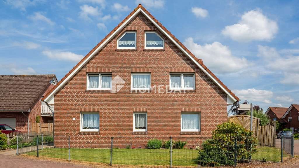 Immobilie in Menslage - Mehrfamilienhaus mit 4 Wohneinheiten, Garten, Dachboden, Carports und ca. 360 m² Wohnfläche - Bild 2