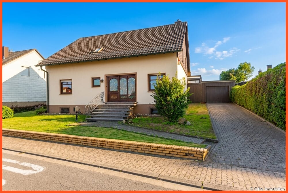 Immobilie in Überherrn - Nähe Saarlouis - Charmantes Einfamilienhaus mit Garage in idyllischer Sonnenlage - Bild 0