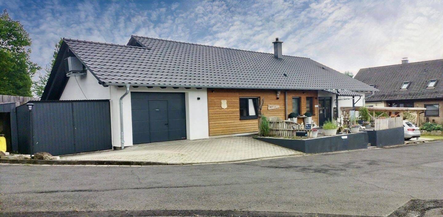 Immobilie in Fritzlar - Modernes Einfamilienhaus mit Einliegerwohnung - Neubaucharakter nach umfassendem Wiederaufbau - Bild 2