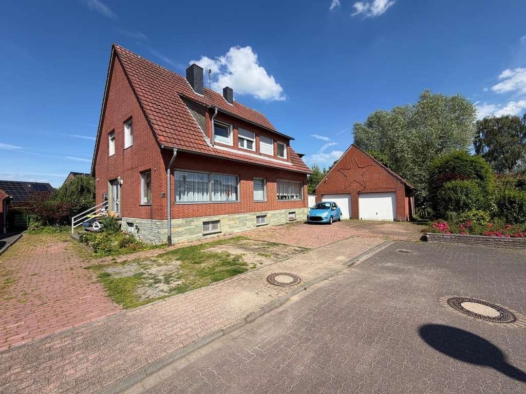 Immobilie in Dülmen - Zweifamilienhaus mit Baureserve in Dülmen-Rorup - Bild 0