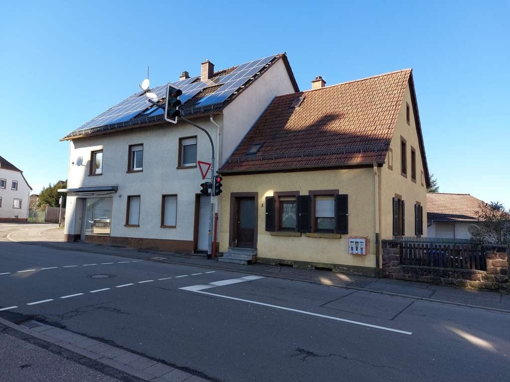 Immobilie in Pirmasens - Gebäudeensemble mit Einfamilienhaus, Wohn- und Geschäftshaus,  Doppelhaushälfte und Nebengebäuden - Bild 1