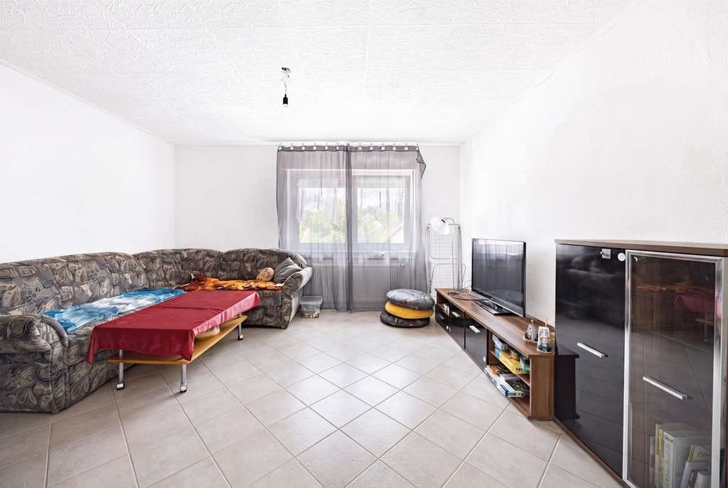 Immobilie in Buseck - *** Vermietete 3-Zimmer-Dachgeschosswohnung in Beuern mit aktuell 7% Bruttomietrendite *** - Bild 1