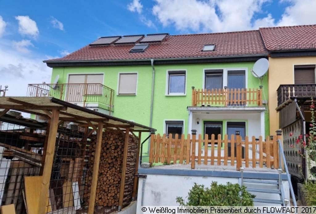 Immobilie in Zeithain - Reihenmittelhaus mit Terrasse, Garten und Garage - Bild 1