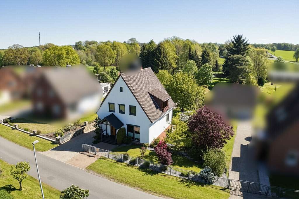 Immobilie in Dünsen - Idyllisches Einfamilienhaus in direkter Feldrandlage - Bild 2