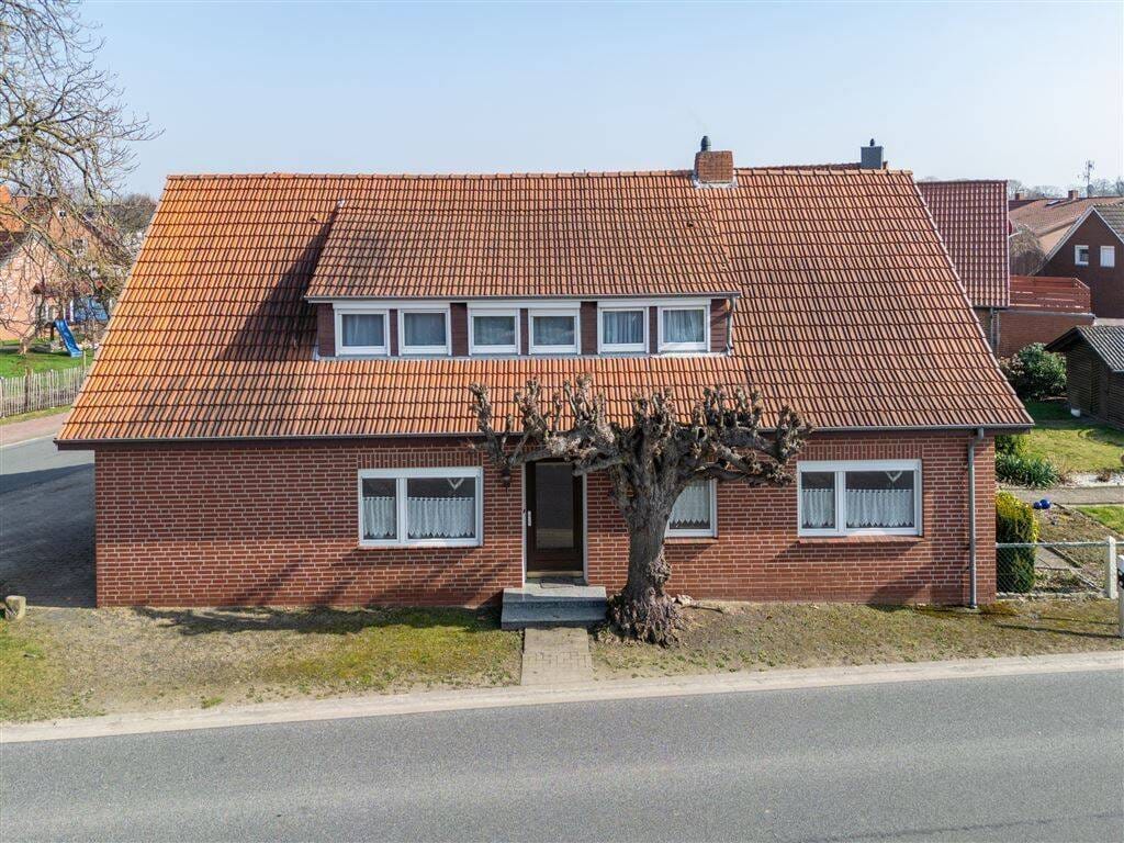 Immobilie in Twistringen - Charmantes Einfamilienhaus in guter Lage, mit Garage und Garten -- Platz zum Leben und zum Wohlfühlen für die ganze Familie! - Bild 3