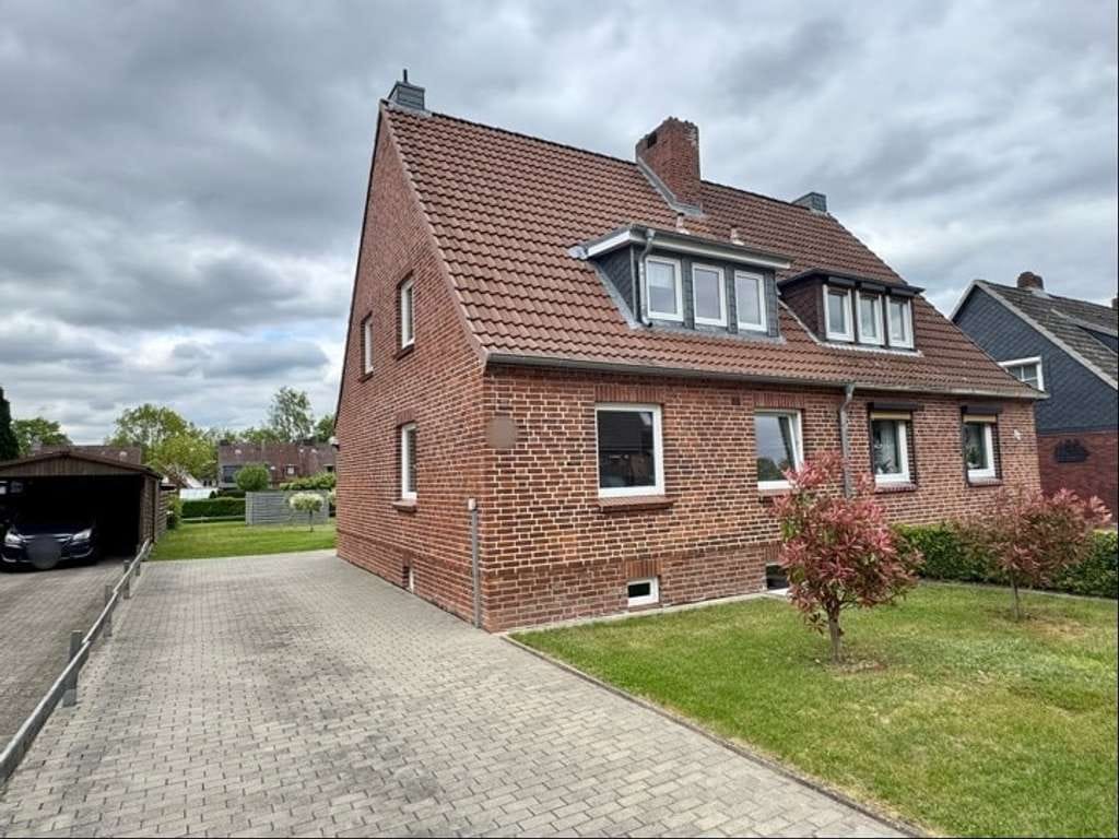 Immobilie in Hohenlockstedt - DHH in Top-Zustand - ab 2019 umfassend saniert - ruhige Lage - Bild 1