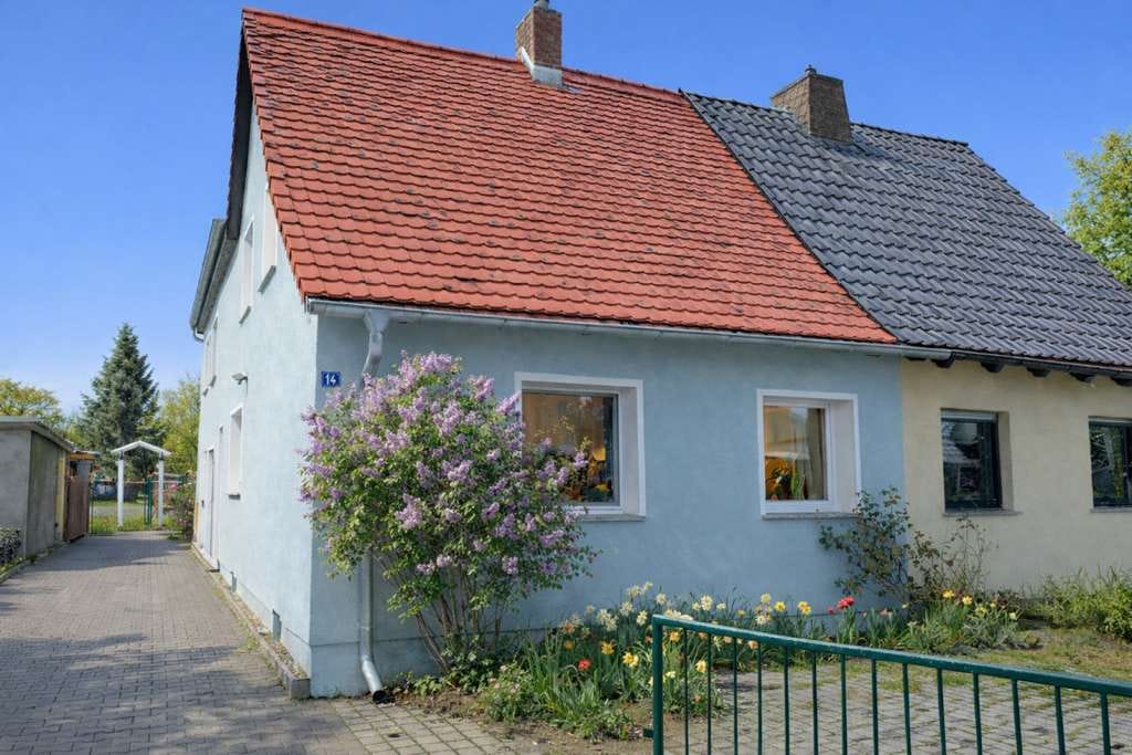 Immobilie in Dreiheide - Einziehen, leben, wohlfühlen: – Doppelhaushälfte mit weitläufigem Garten in Torgau - Bild 1