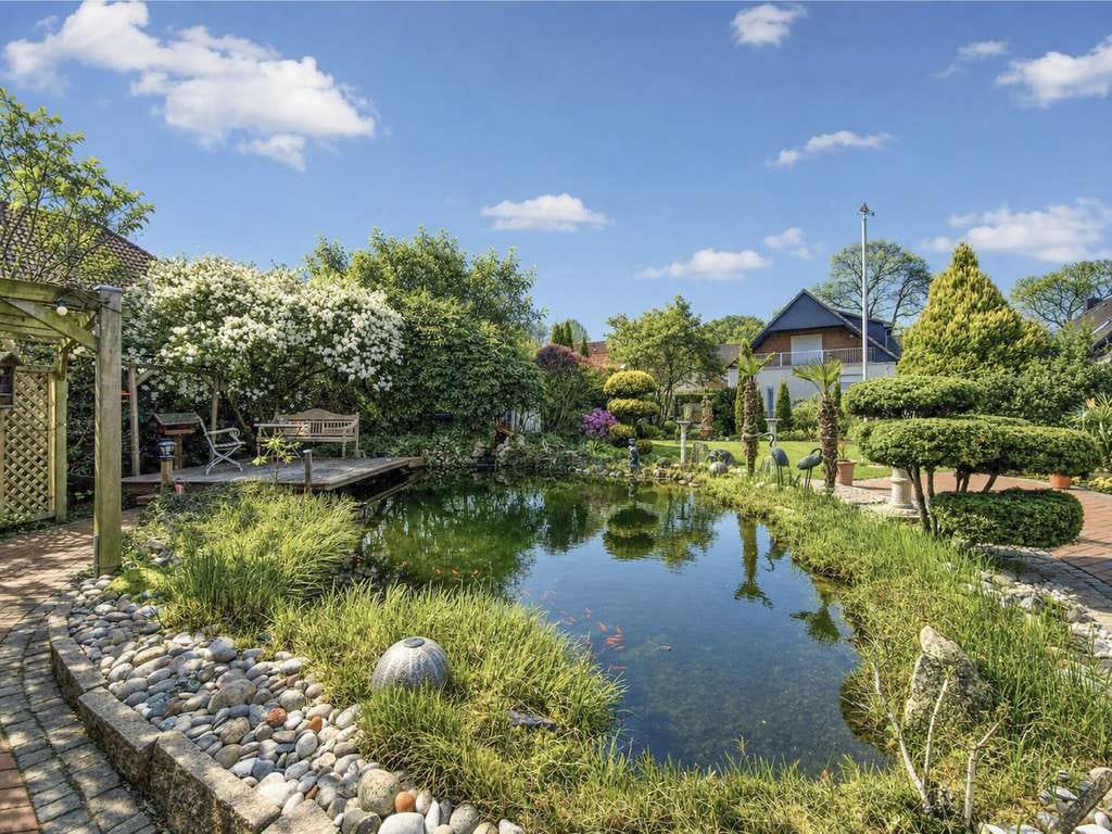 Immobilie in Hohenlockstedt - Zwischen Gartenidylle und Wohnkomfort – Großzügiges Ein-/Zweifamilienhaus auf 1.176 m² Traumgrundstü - Bild 4