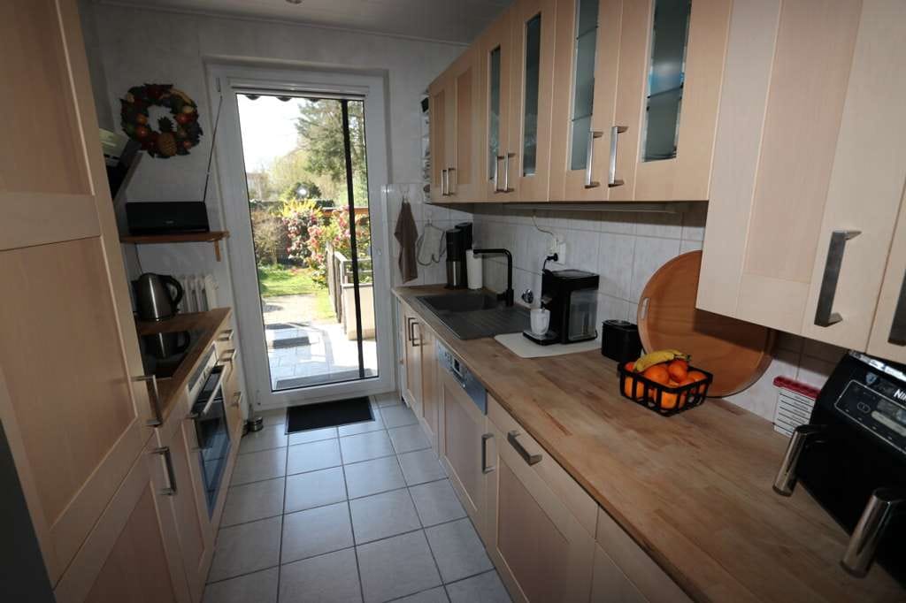 Immobilie in Kaarst - + Kaarst + vermietetes 6-Parteien-Haus + Baujahr 1968 + insgesamt ca. 312 m² Wohnfläche + Garage + - Bild 4