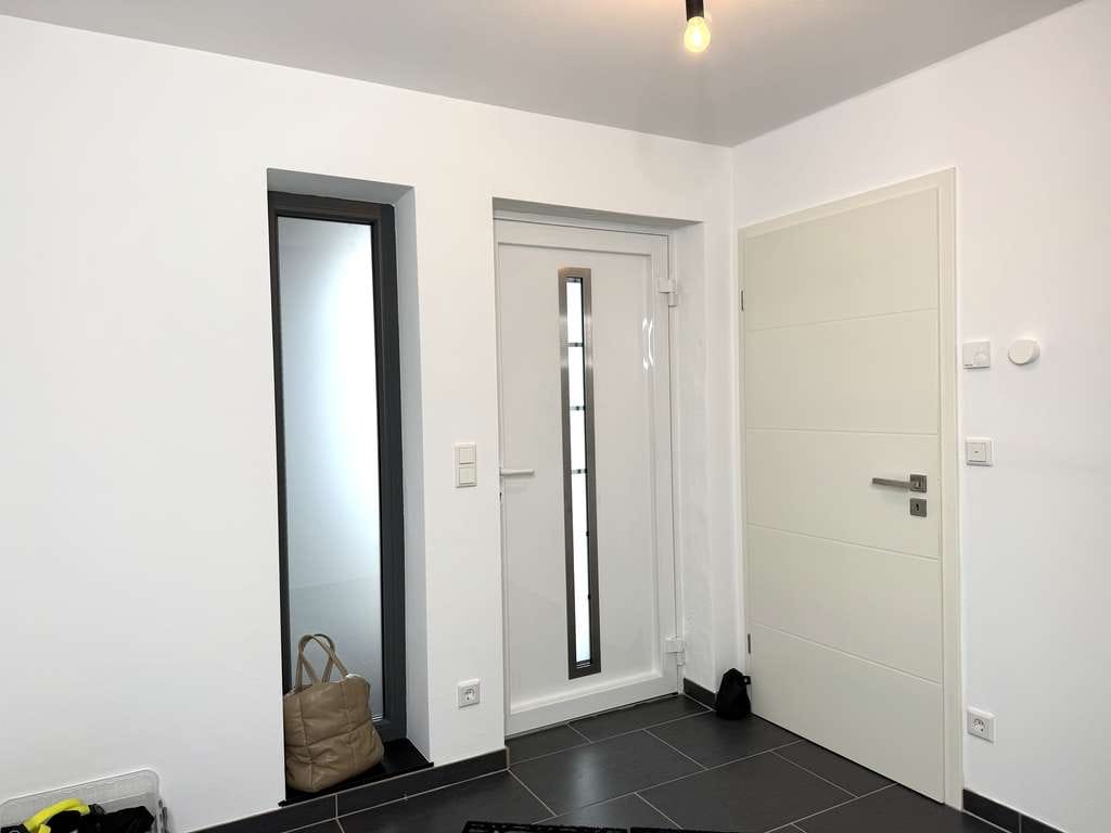 Immobilie in Ober-Hilbersheim - Modernisierte Ober- und Dachgeschosswohnung über zwei Ebenen im ausgebauten Bungalow - Bild 3