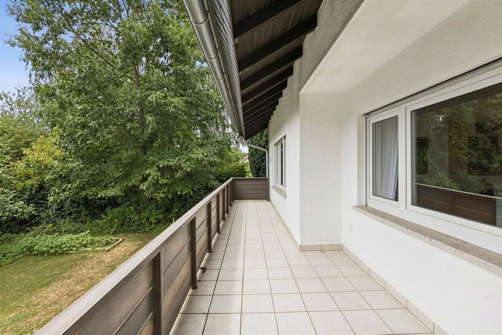 Immobilie in Buseck - Ruhig wohnen, gute Infrastruktur  – 4,5-Zimmerwohnung in attraktiver Waldrandlage - Bild 2