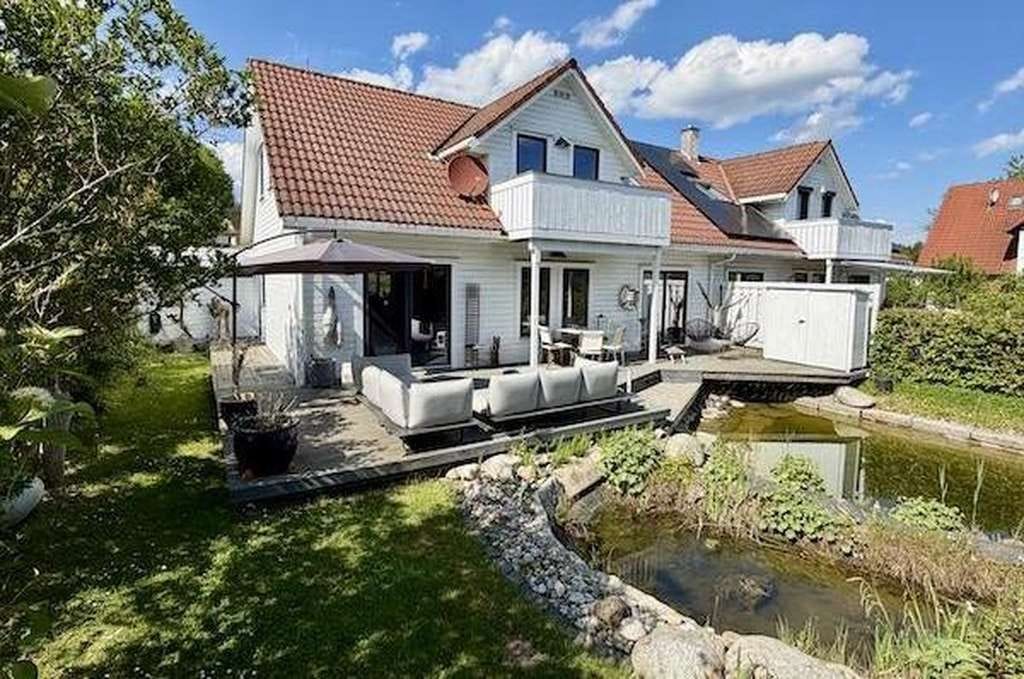 Immobilie in Gerolsbach - Charmantes norwegisches Holzhaus mit Schwimmteich und traumhaftem Naturgarten - Bild 0