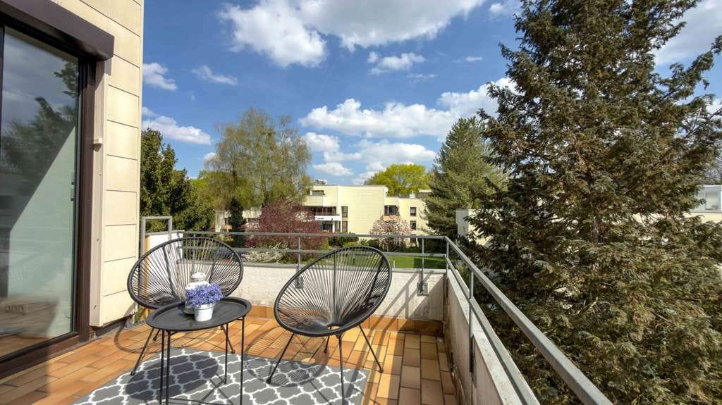 Immobilie in Puchheim - Großzügige 4-Zimmer-Wohnung mit Süd-West-Dachterrasse, Galerie, 2 Bädern und Tiefgarage - Bild 4