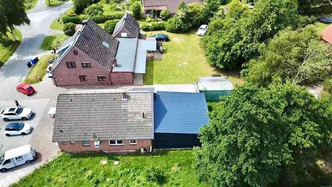 Immobilie in Südbrookmerland - Vielseitiges Wohn- und Geschäftshaus mit 3 Einheiten, kernsanierter Fleischerei & PV-Anlage - Bild 4