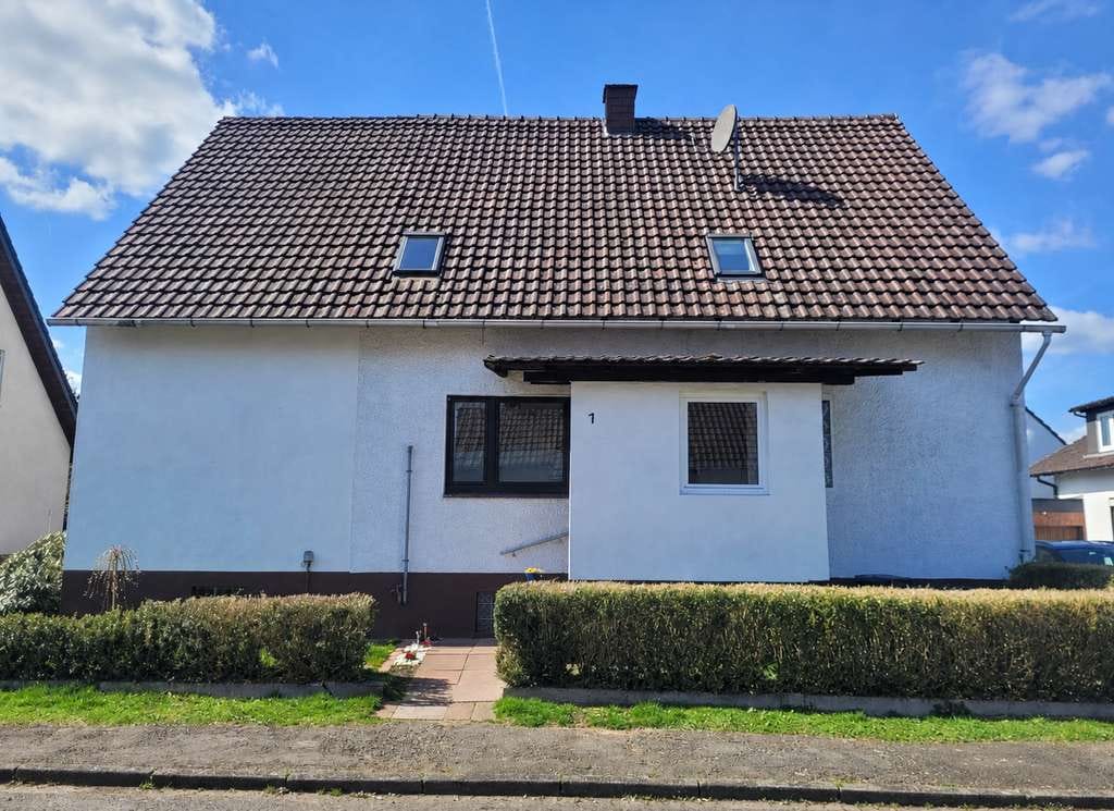Immobilie in Bodenfelde - * Freistehendes Einfamilienhaus in Wahmbeck * Wfl. ca. 155 m² * GS. ca. 1002 m² * 2 Garagen * - Bild 0