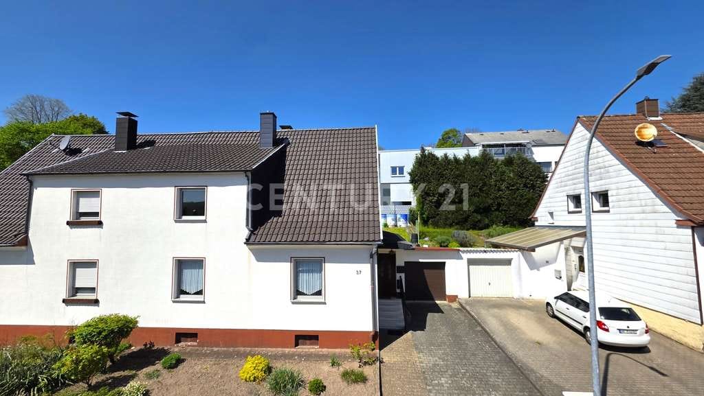 Immobilie in Sulzbach/Saar - Attraktives Familienidyll, Doppelhaushälfte mit Garten und Garage in Sulzbach - Hühnerfeld - Bild 1