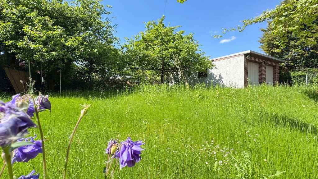 Immobilie in Egelsbach - Freistehendes Mehrfamiliehaus mit ELW und Doppelgarage in ruhige Lage, Egelsbach - Bild 2