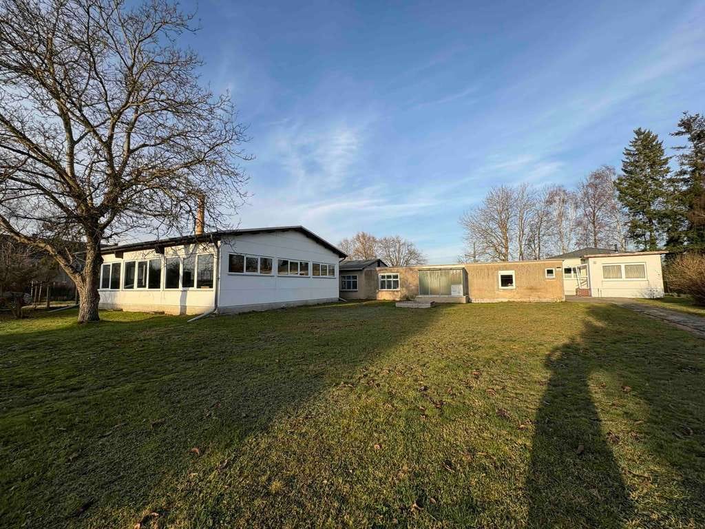 Immobilie in Bad Wilsnack - Wohnhaus mit großer Werkstatt und Garagen - auch als Baugrundstück geeignet - Bild 1