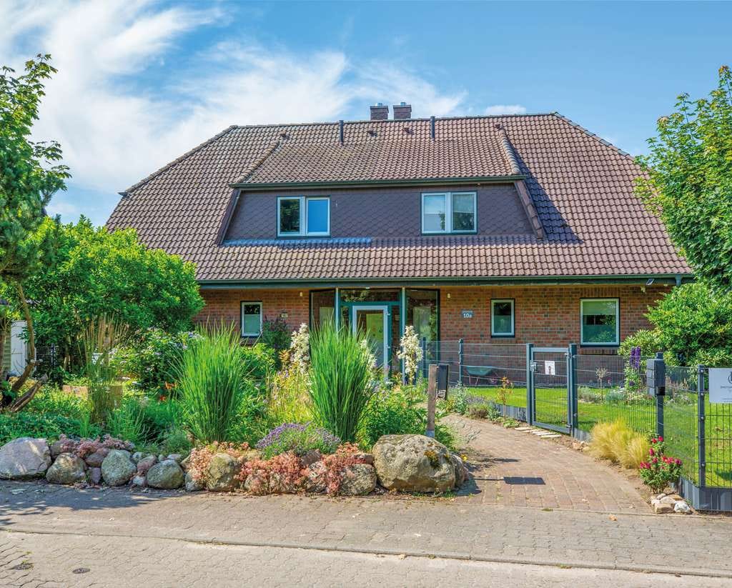 Immobilie in Brunsbek - ! Neu ! 22946 Brunsbek: Gepflegte Doppelhaushälfte mit Carport und Sauna - Bild 1