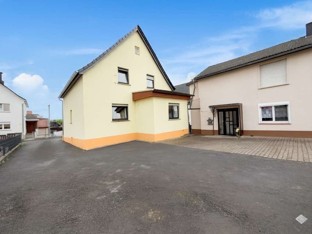 Immobilie in Schöffengrund - Modernes Familienidyll am Waldrand: Einziehen & Wohlfühlen in Schöffengrund-Laufdorf  - Bild 1
