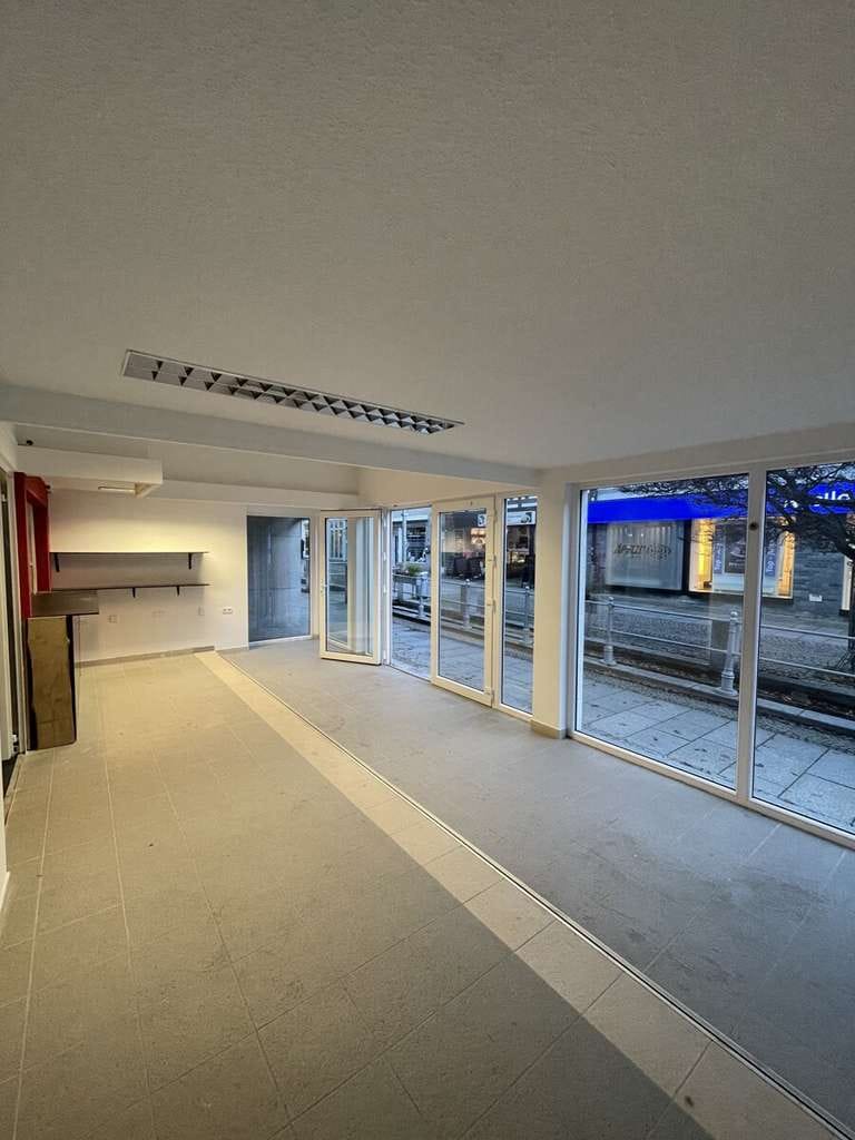 Immobilie in Alfeld (Leine) - Teilmodernisiertes Wohn- und Geschäftshaus im Herzen der Altstadt - Bild 1