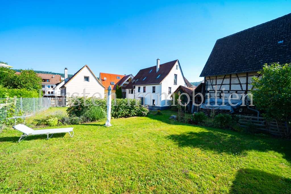 Immobilie in Ammerbuch - Modernisiertes Familienhaus mit Einliegerwohnung und sonnigem Grundstück in Ammerbuch - Bild 1