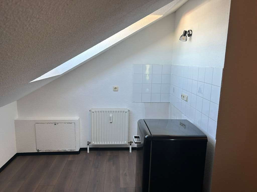 Immobilie in Nieder-Olm - Schicke 2 Zimmer DG-Wohnung in Nieder-Olm - Bild 2