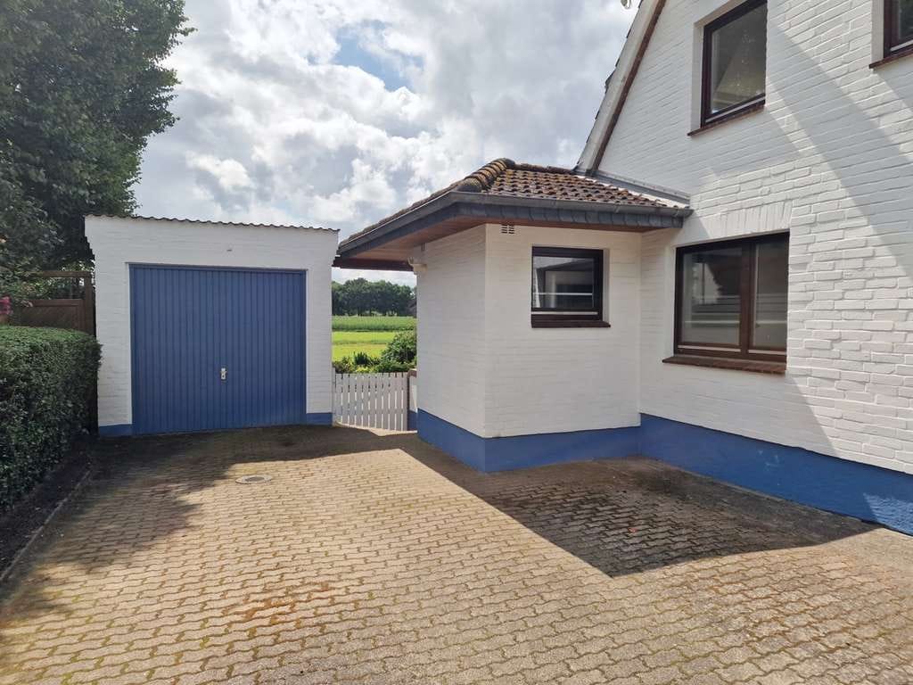Immobilie in Ostrohe - Blick ins Grüne - Einfamilienhaus mit Garage und schönem Grundstück in guter Lage - Bild 1