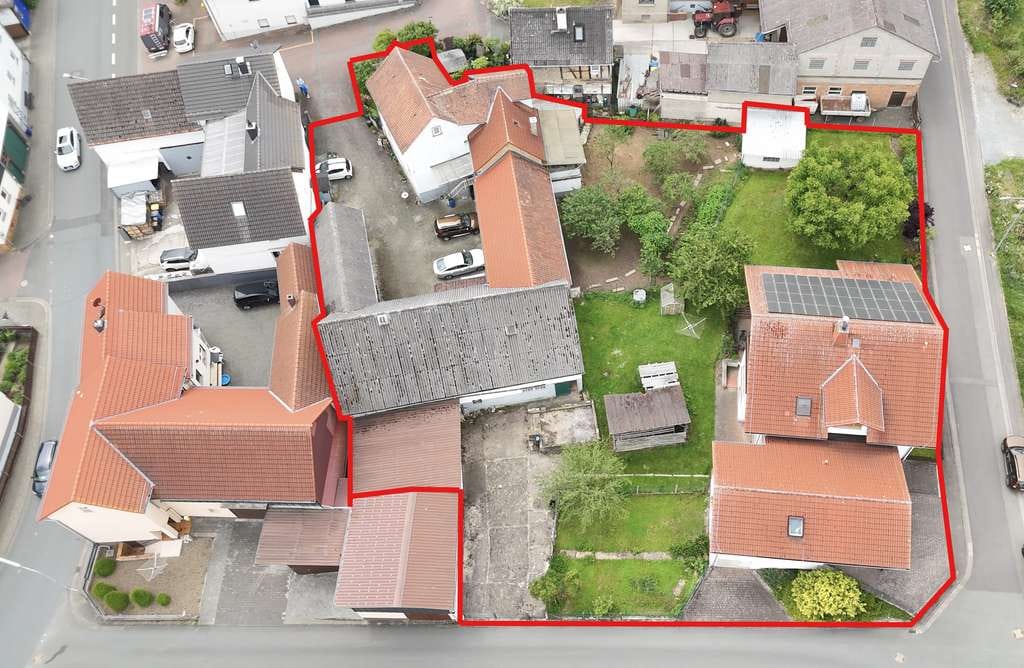Immobilie in Hüttenberg - Wohnkomplex mit Baugrundstück und Ländereien - Bild 0