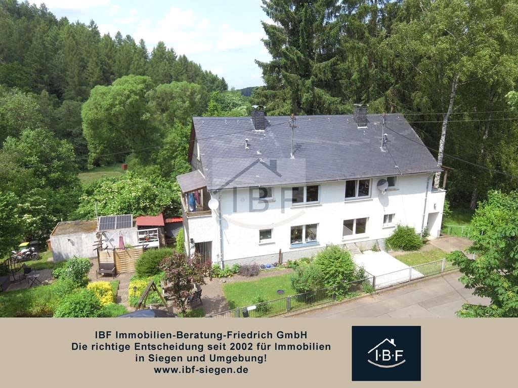 Immobilie in Burbach - Vielseitiges Doppelhaus – Ideal für Familien oder zur Kapitalanlage - Bild 0
