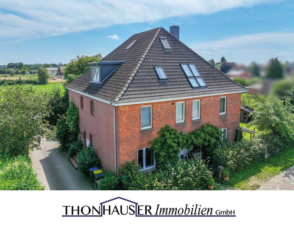Immobilie in Schretstaken - 21493 Schretstaken - Gepflegte 3-Zimmer-Eigentumswohnung mit Balkon und Garten - Bild 0