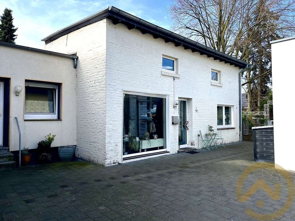 Immobilie in Kamp-Lintfort - Solide Kapitalanlage mit großer Garage - Bild 2