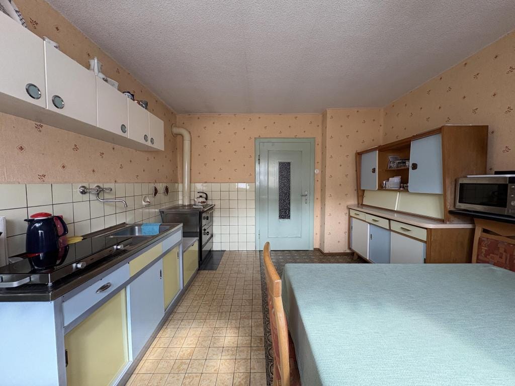 Immobilie in Meinheim - Gepflegtes Einfamilienhaus mit Nebengebäude und Entwicklungspotenzial - Bild 2