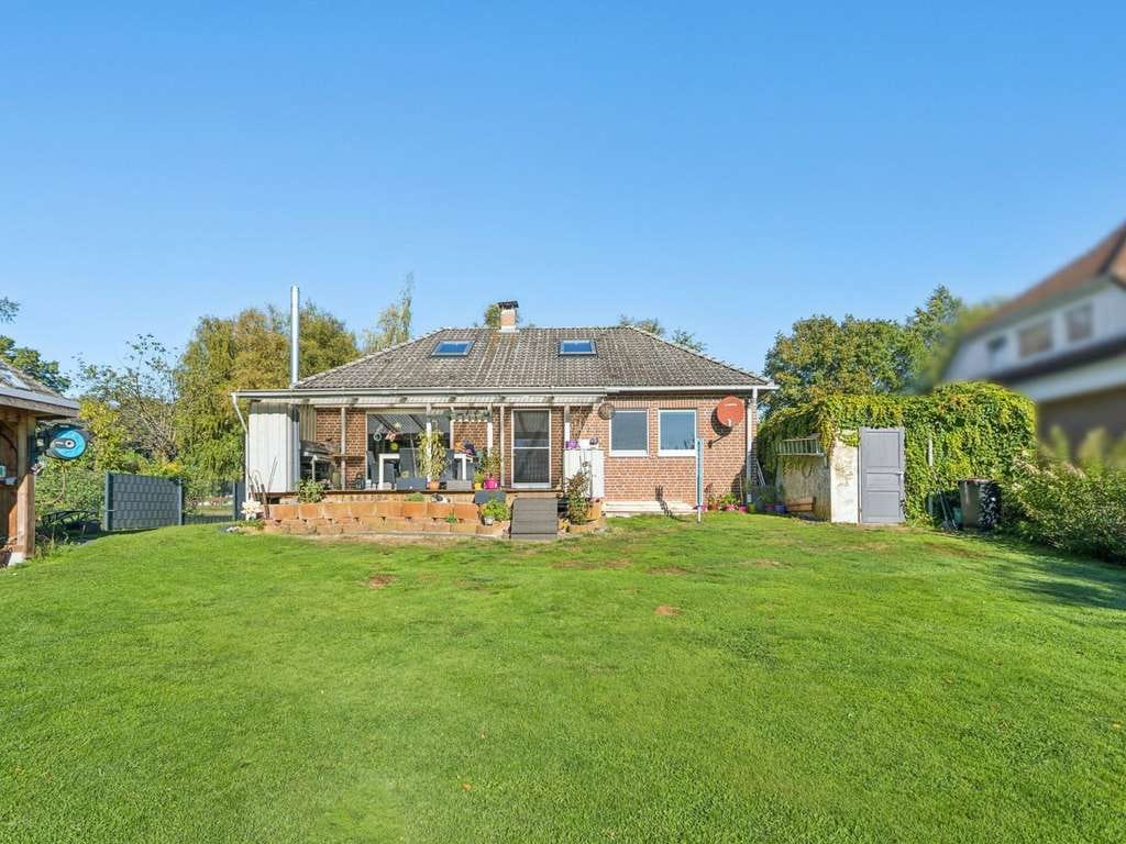 Immobilie in Lilienthal - Einziehen und Wohlfühlen – Einfamilienhaus mit großzügigem Garten in Lilienthal-Worphausen - Bild 1