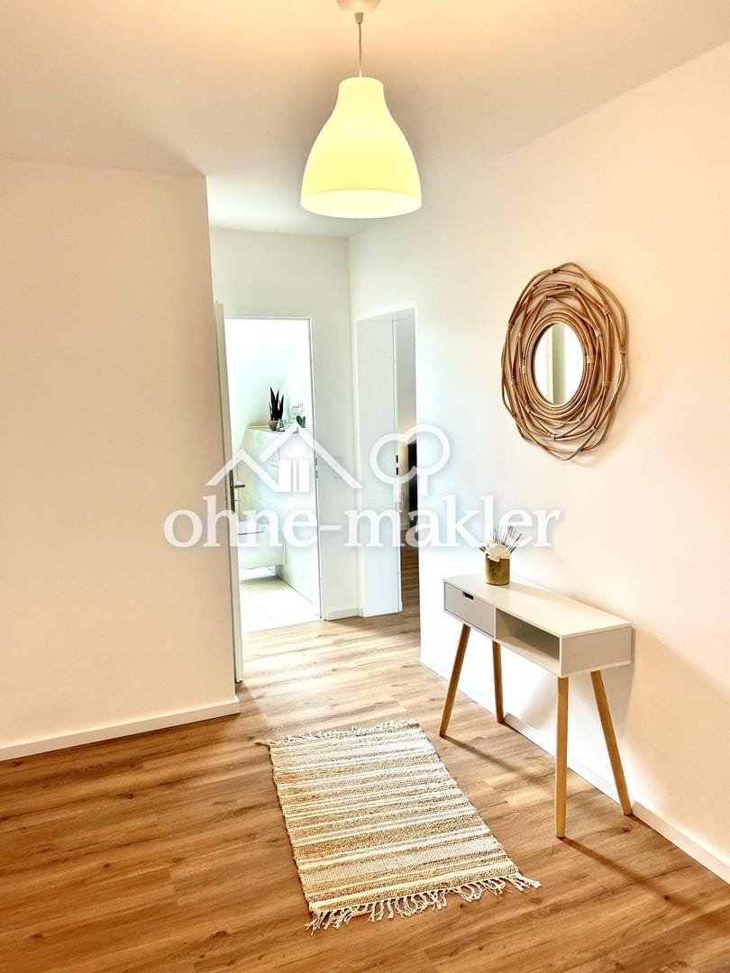 Immobilie in Hasbergen - Dachgeschosswohnung in Hasbergen - Bild 1