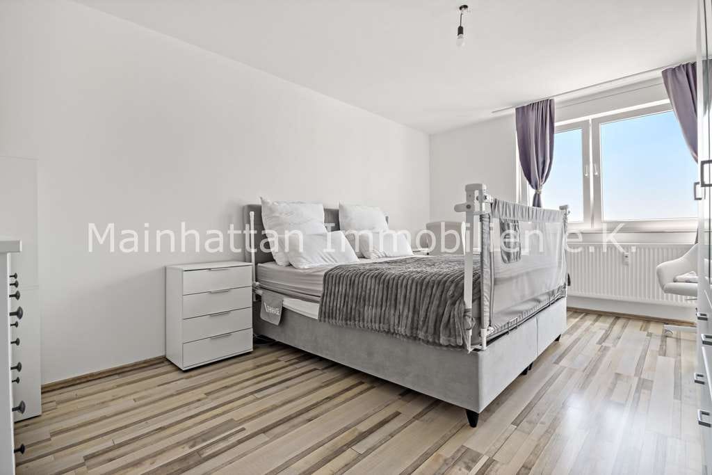 Immobilie in Hattersheim - Planbare Mieteinnahmen statt Risiko …vermietete 2 Zimmerwohnung mit Balkon und Weitblick - Bild 1