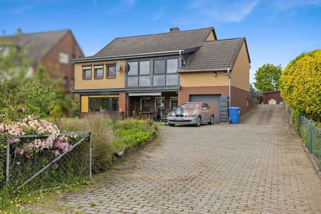 Immobilie in Langwedel - Besondere Lage - Geplegtes Einfamilienhaus mit Einliegerwohnung in Feldrandlage - Bild 0