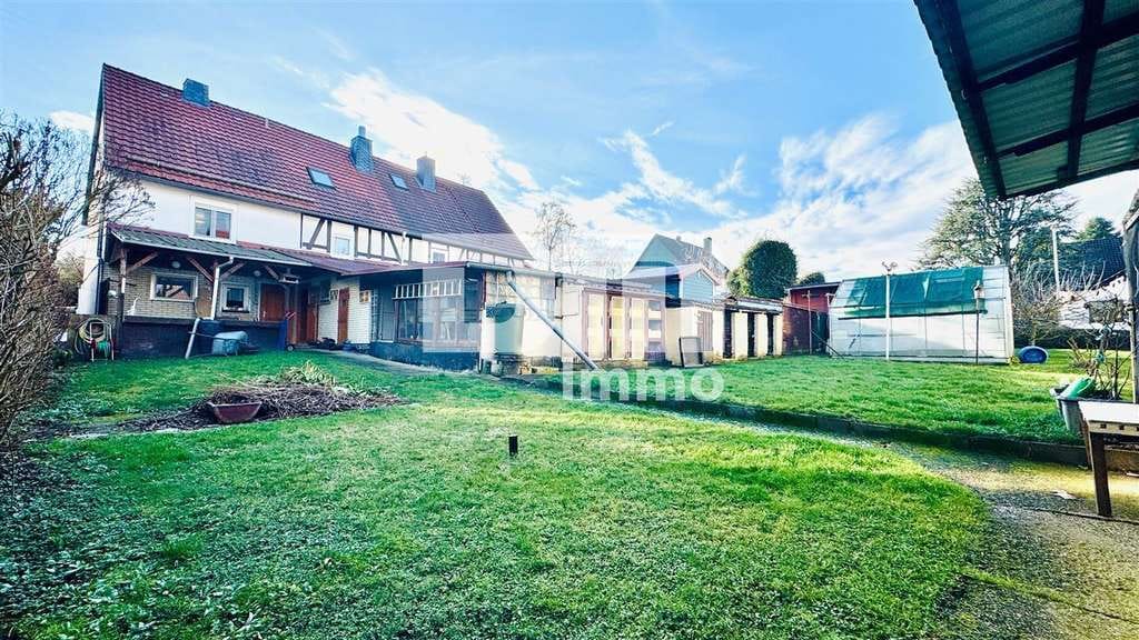 Immobilie in Habichtswald - Schöne Doppelhaushälfte mit Nebengebäude, Garage und angelegtem Gartenbereich - Bild 4