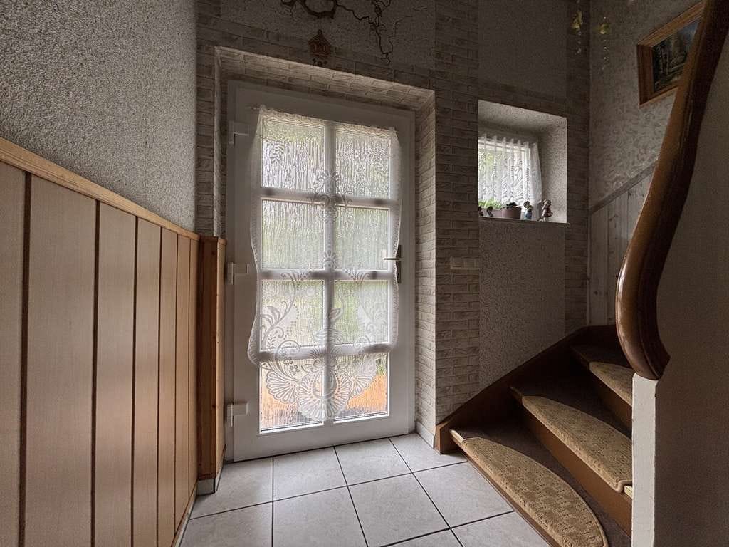 Immobilie in Niedergörsdorf - Niedergörsdorf: Charmantes Reihenhaus mit großem Naturgrundstück – sanierter Altbau in ruhiger Lage - Bild 1